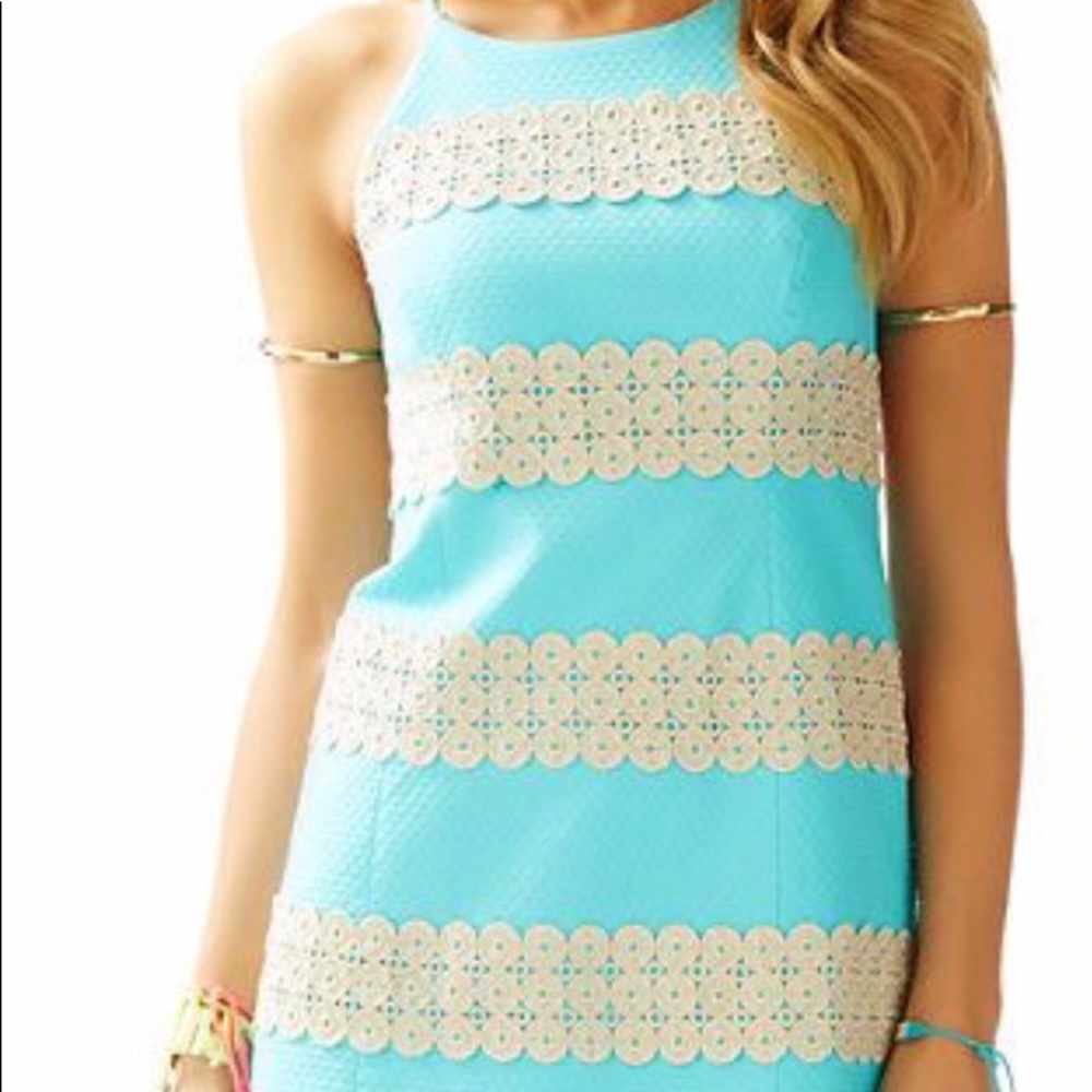 NWOT polished dress that's both sexy and elegant.